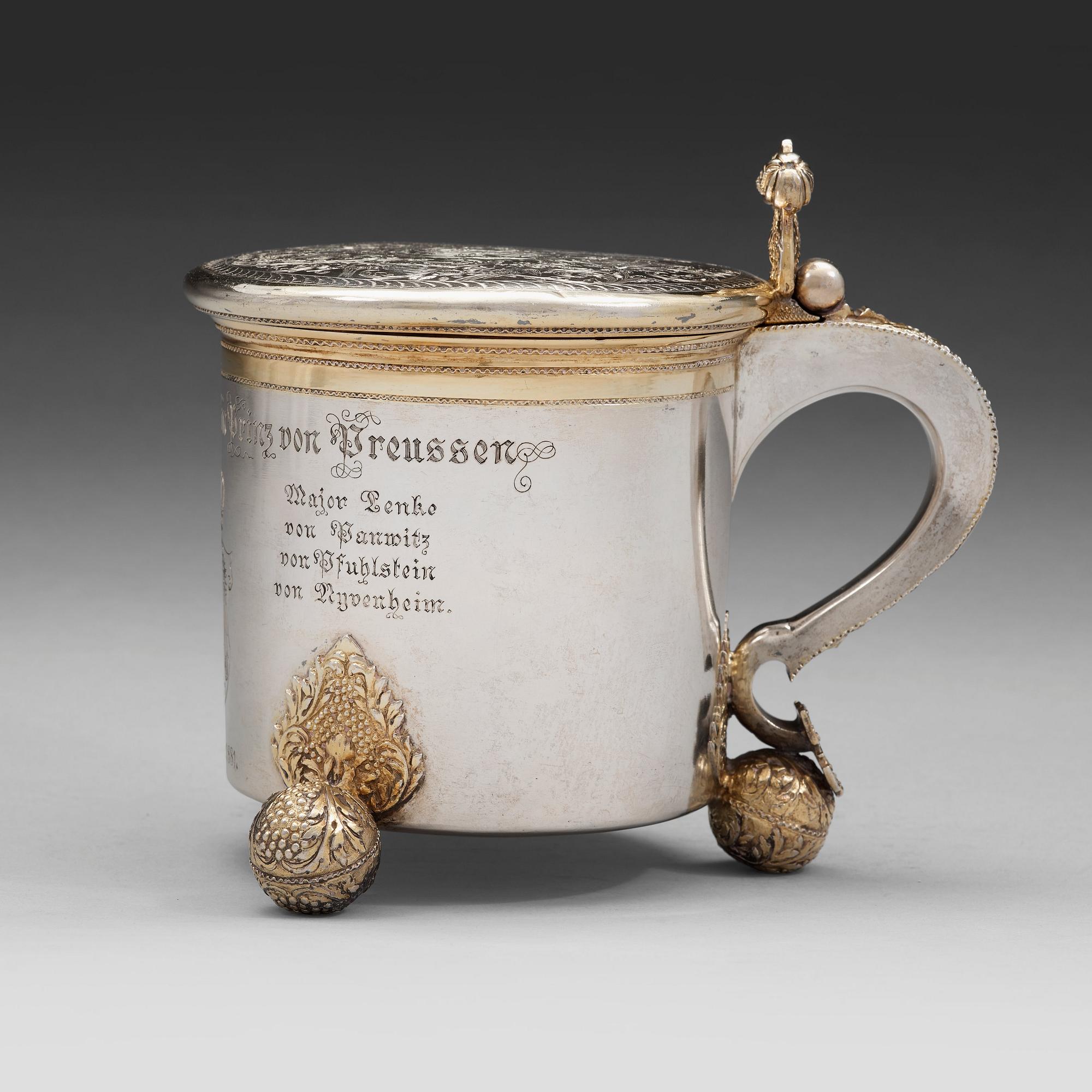 A Swedish early 18th century parcel-gilt silver tankard, mark of Sven Wallman, Gothenburg 1704.
