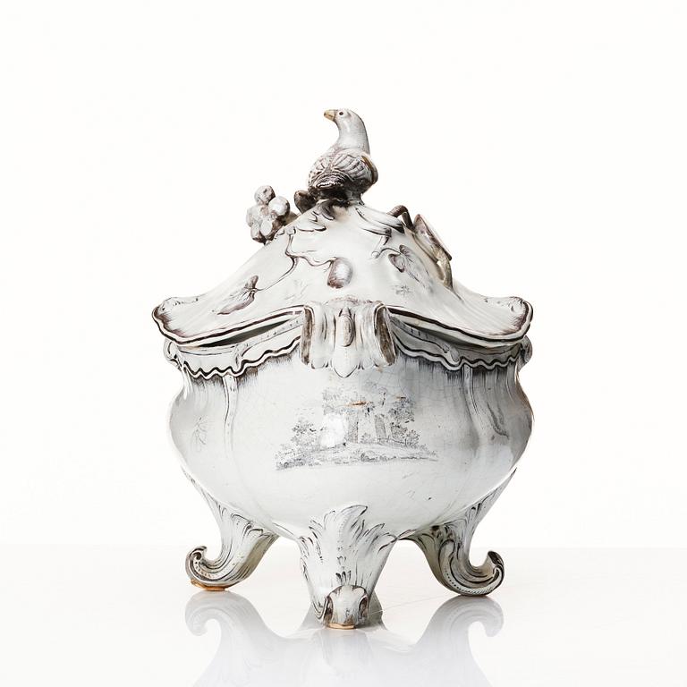 A Swedish Marieberg faience tureen with cover, dated 1768.