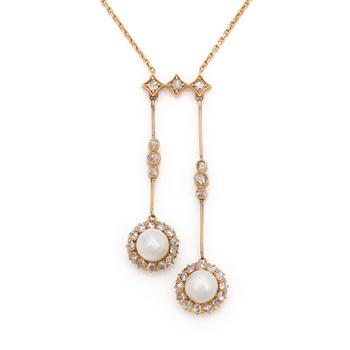 A necklace set with rose-cut diamonds and cultured mabé pearls.