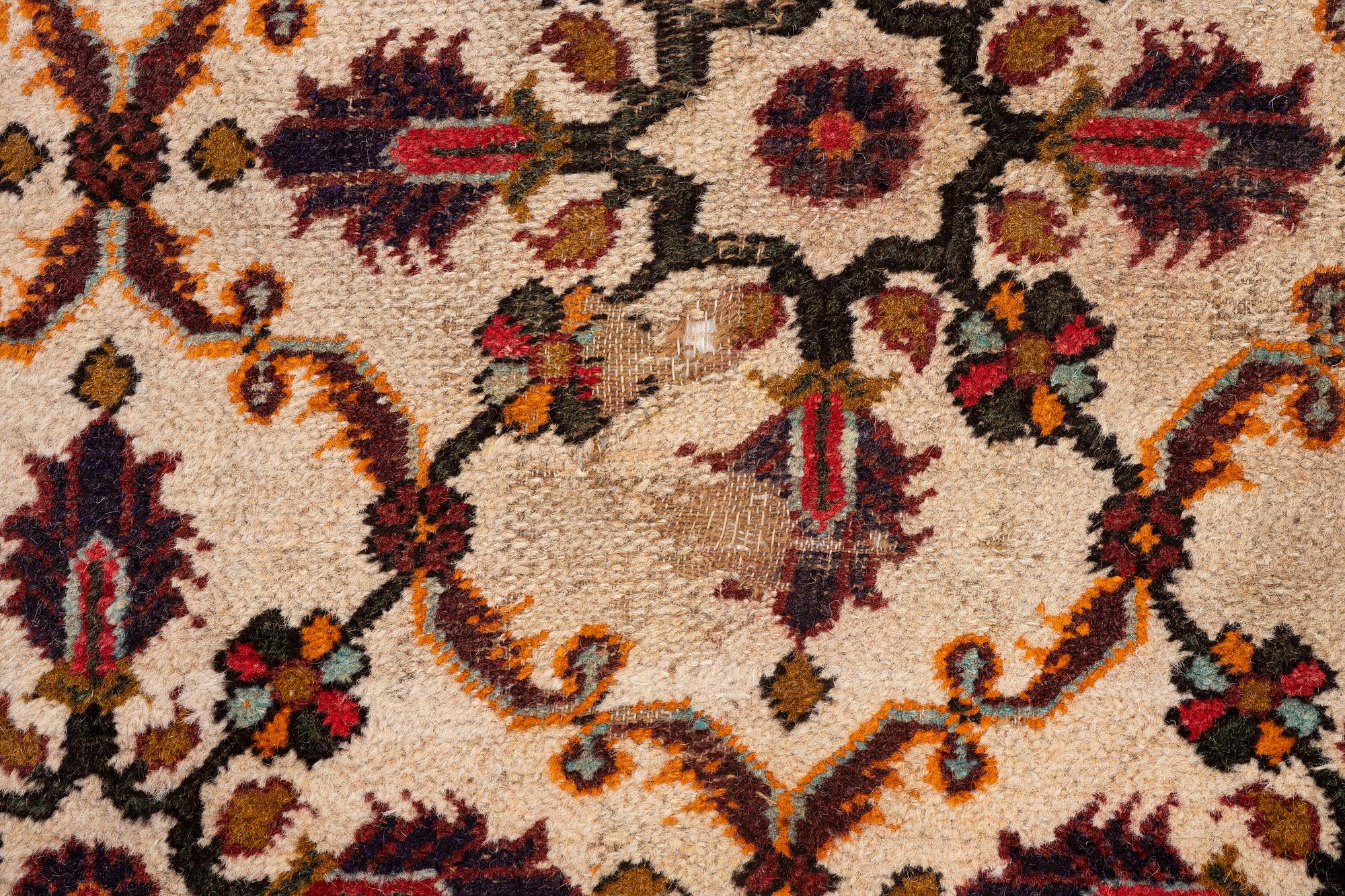 A Masulipatnam carpet, north India, c. 402 x 333 cm.