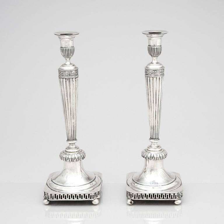 A pair of Swedish early 19th century silver candelsticks, mark of Jacob Hallardt, Stockholm 1811.