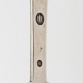 A set of  four silver serving spoons, with a set of 12 coffee spoons, Denmark, early and first half of the 20th century.