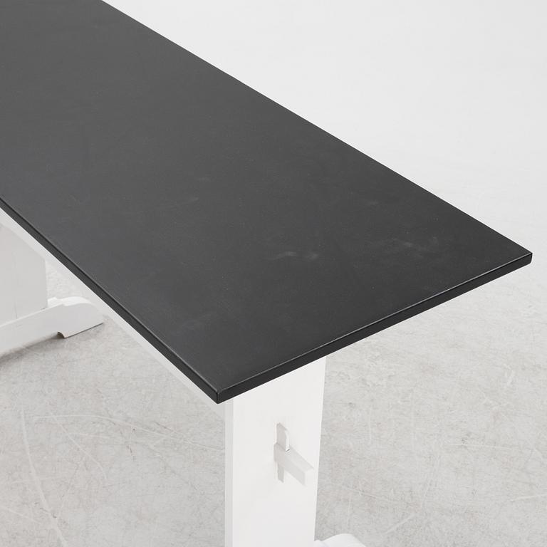 A painted table, 20th Century.