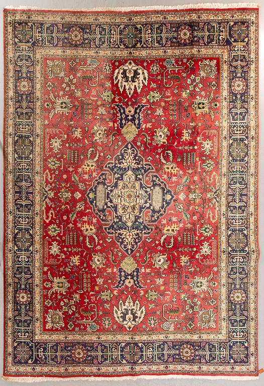 A semiantique Tabriz carpet ca 370x296 cm.