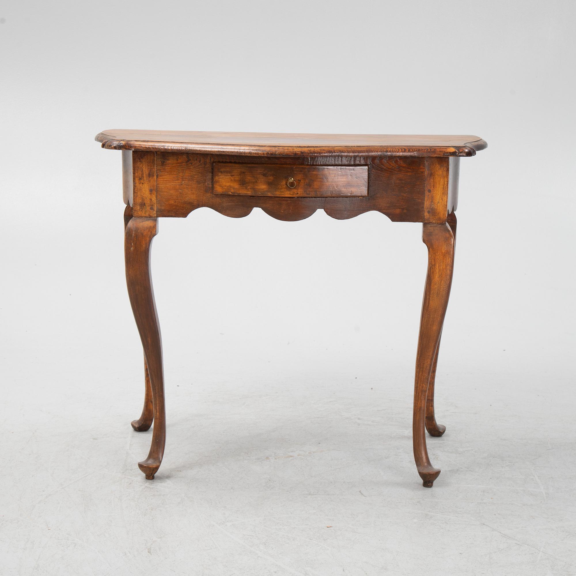 A rococo style side table, from around the year 1900.