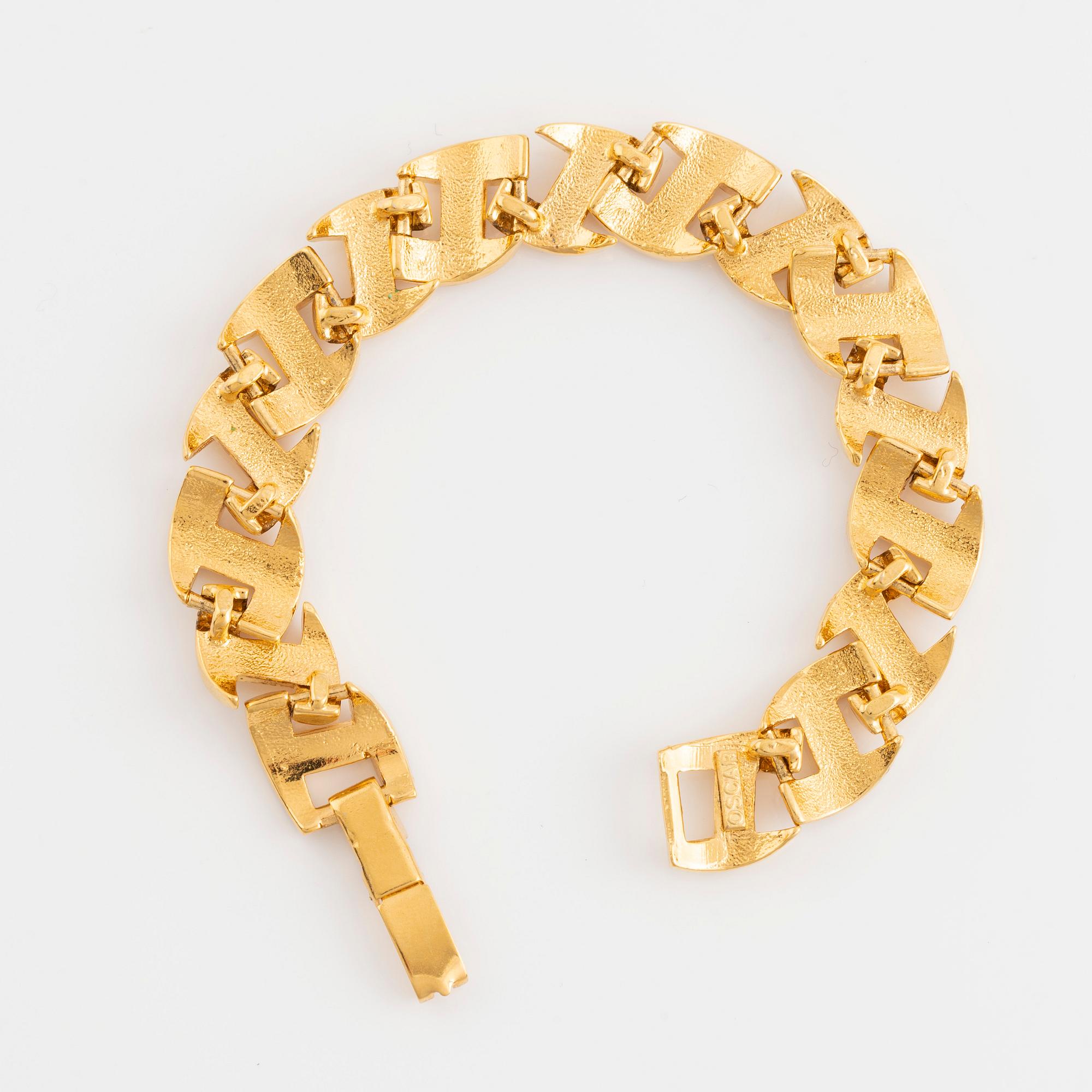 Oscar de la Renta bracelet, yellow metal with strass.