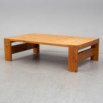 A 1960s pine coffee table.