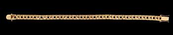 ARMBAND, förgyllt sterlingsilver, granater tot ca 2.89 ct, vita topaser tot ca 2.89 ct.