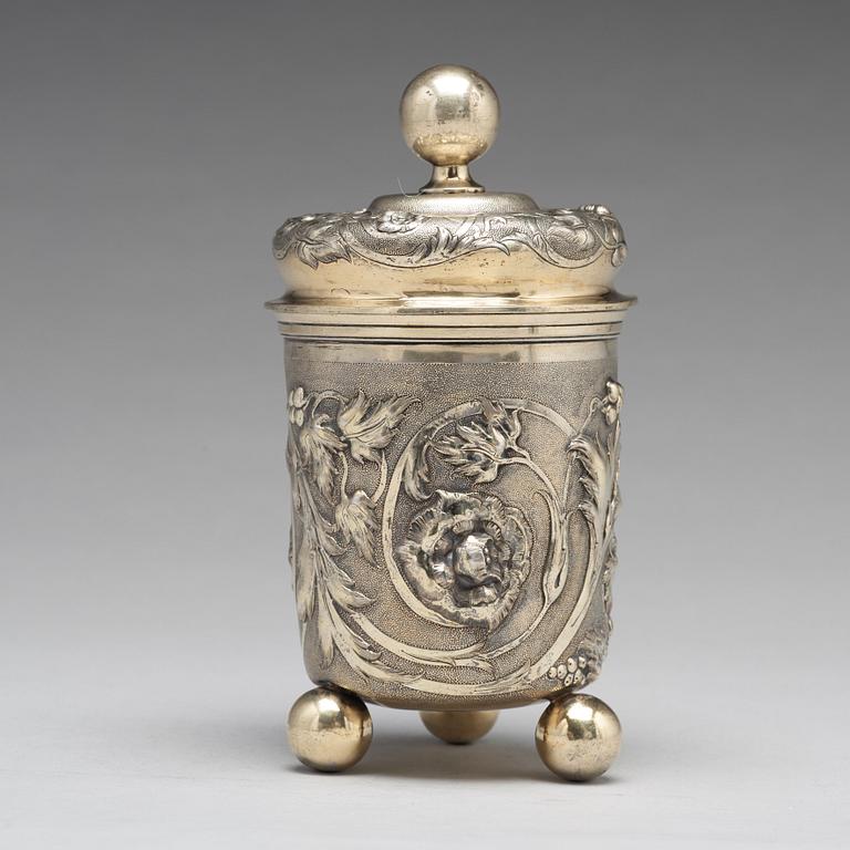 A Russian 19th century parcel-gilt silver beaker and cover, Moscow 1857.