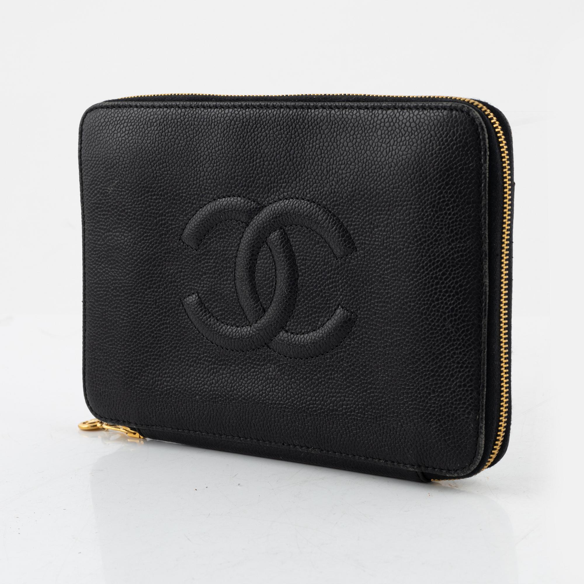 Chanel, A black caviar leather clutch, 1997 - 1999.
