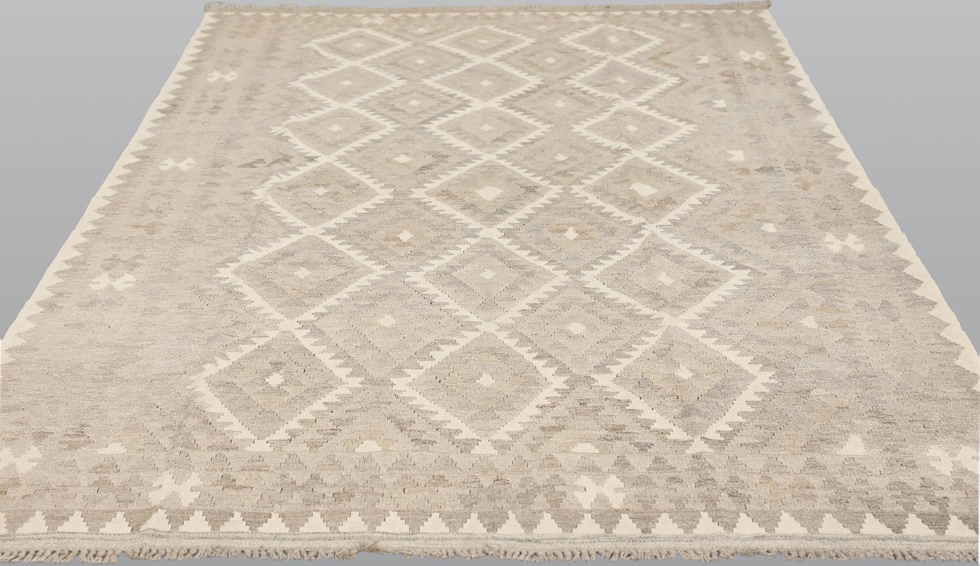 A Kelim carpet, c. 222 x 163 cm.