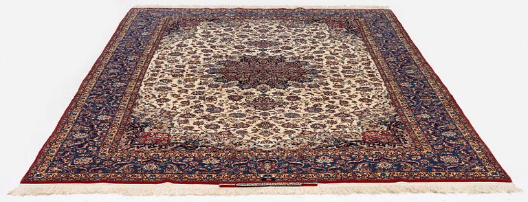 A semi-antique Isfahan carpet, Central Persia, signed (Ali) Seirafian, 328 x 250 cm.