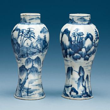A matched pair of blue and white vases, Qing dynasty, Kangxi (1662-1722).