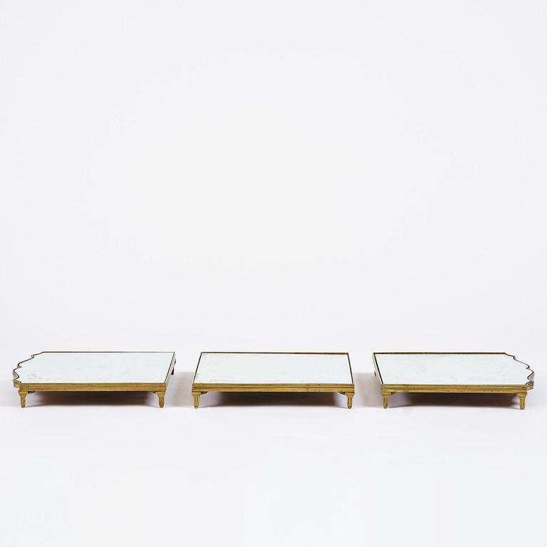 A Gustavian three-piece brass and glass surtout de table, Stockholm, later part 18th century.