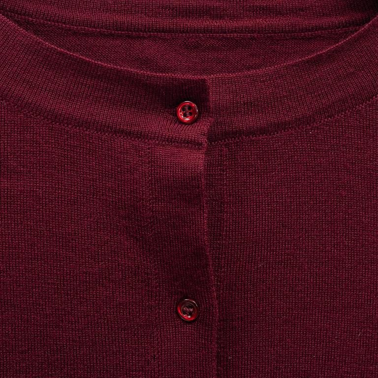 Alaïa, a burgundy wool twin set with cardigan and top, French size 38.
