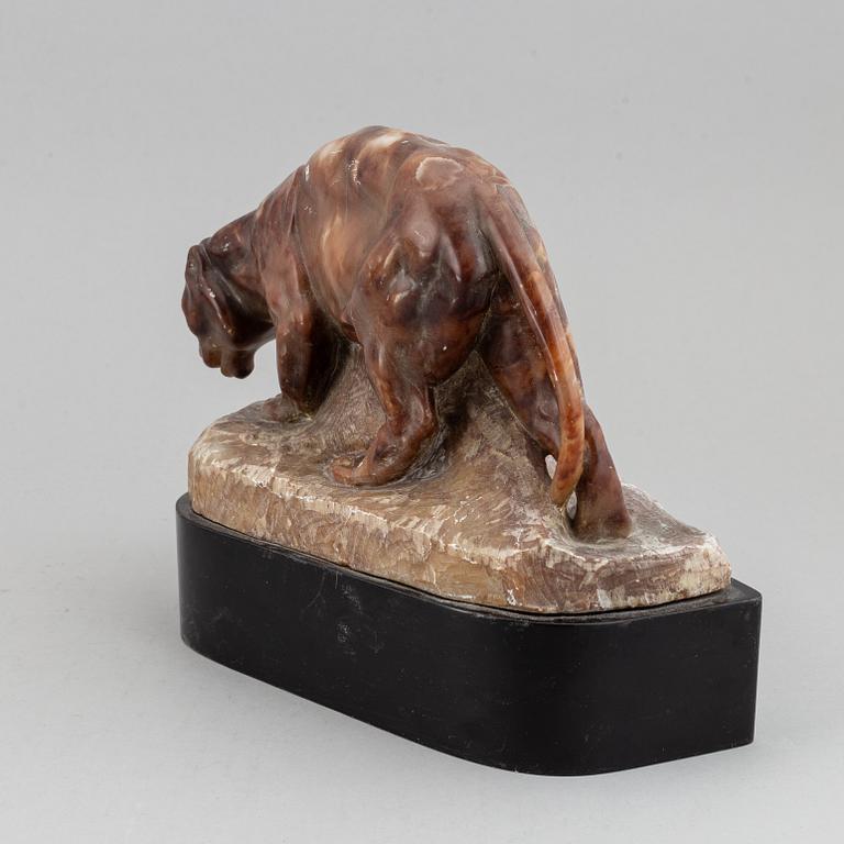A 20th century stone sculpture of a panther.