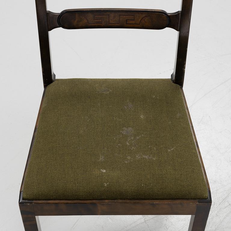 A Swedish Grace birch dining table and four chairs, 1920's/1930's.