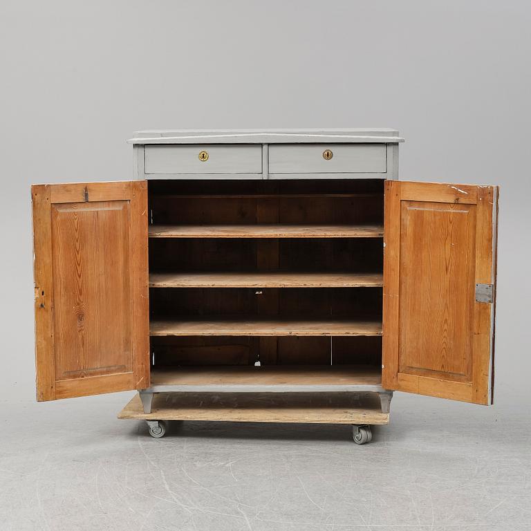 A mid 19th Century painted cupboard.