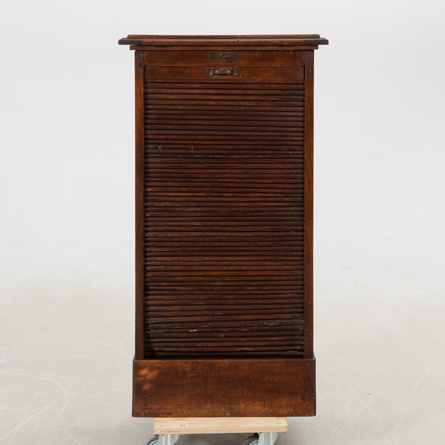 Jalousie cabinet, first half of the 20th century.