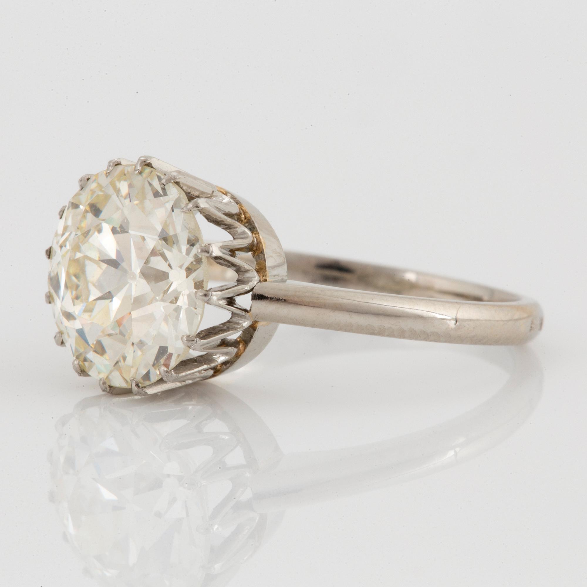 An 18K white gold ring set with an old-cut diamond ca 3.80 cts quality ca J/K vs.