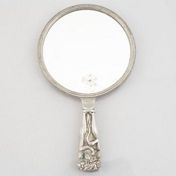 A pewter hand mirror, model A148, Firma Svenskt Tenn, Stockholm 1920's/30s.