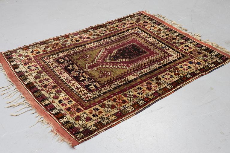 A carpet, antique Avanos, ca 190 x 136 cm (as well as 5 and 6 cm of flat weave on each end.).