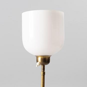 A brass floor lamp, 1940s.