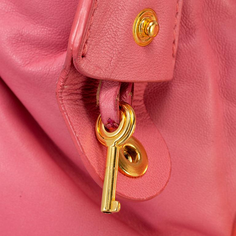 MIU MIU, a pink leather bag.