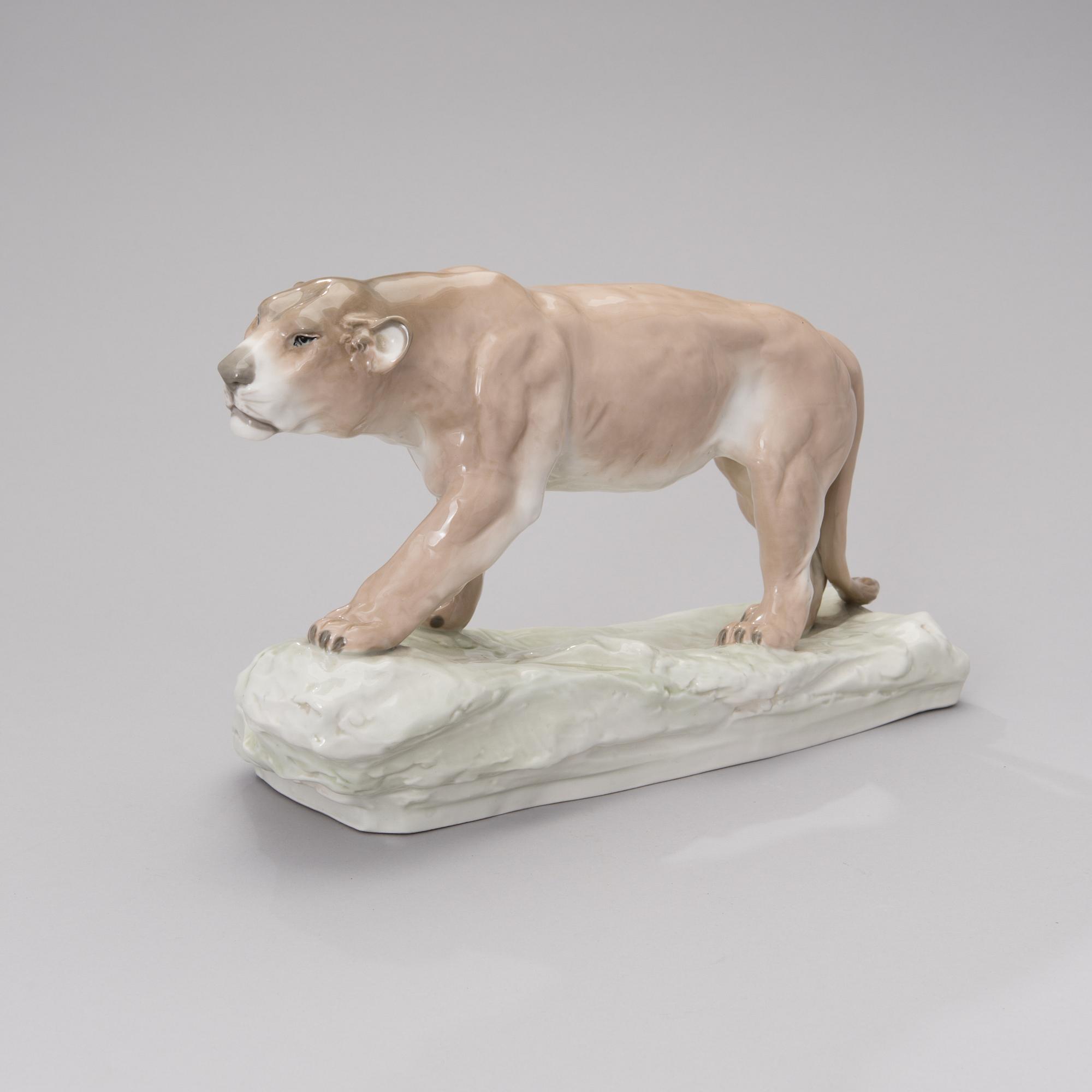 An Amphora porcelain figurine 2882, impressed mark Strasser Wien.