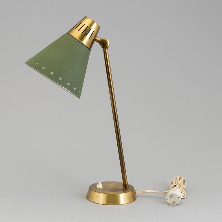 A mid 20th century table lamp by Einar Bäckström.