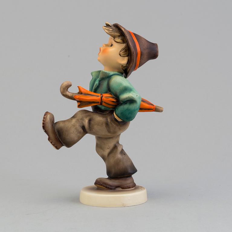 A Hummel porcelain figurine from Goebel, West Germany.