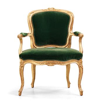 A Louis XV mid 18th century armchair.