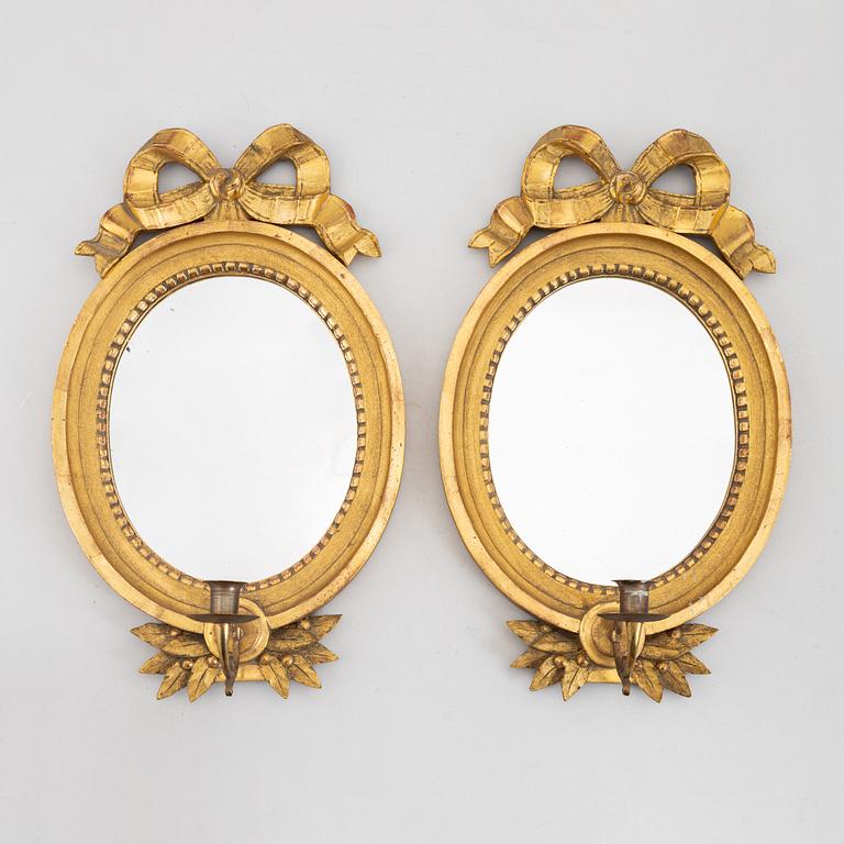 A pair of Gustavian style mirror sconces, beginning of the 20th century.