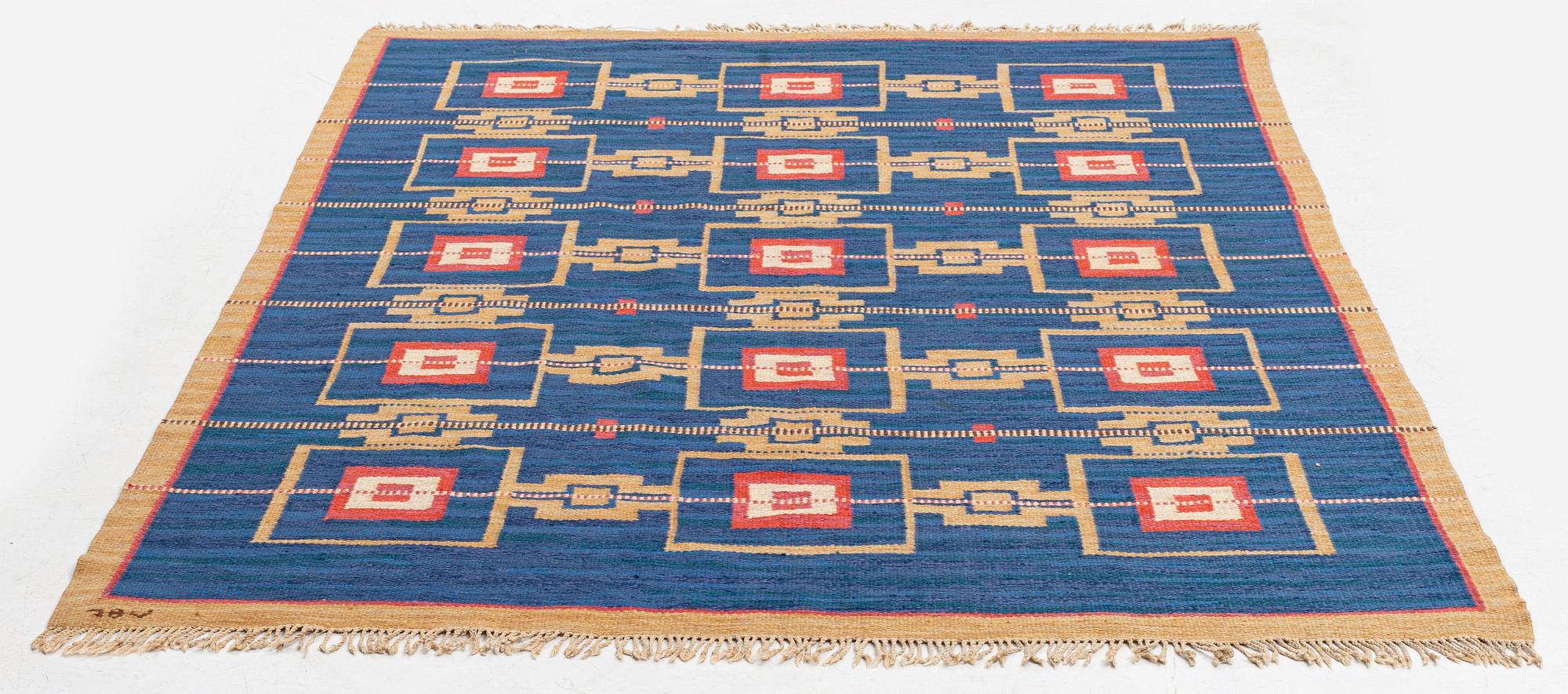 a carpet, flat weave, c 243 x 170 cm, signed JBV (Johanna Brunssons Vävskola).