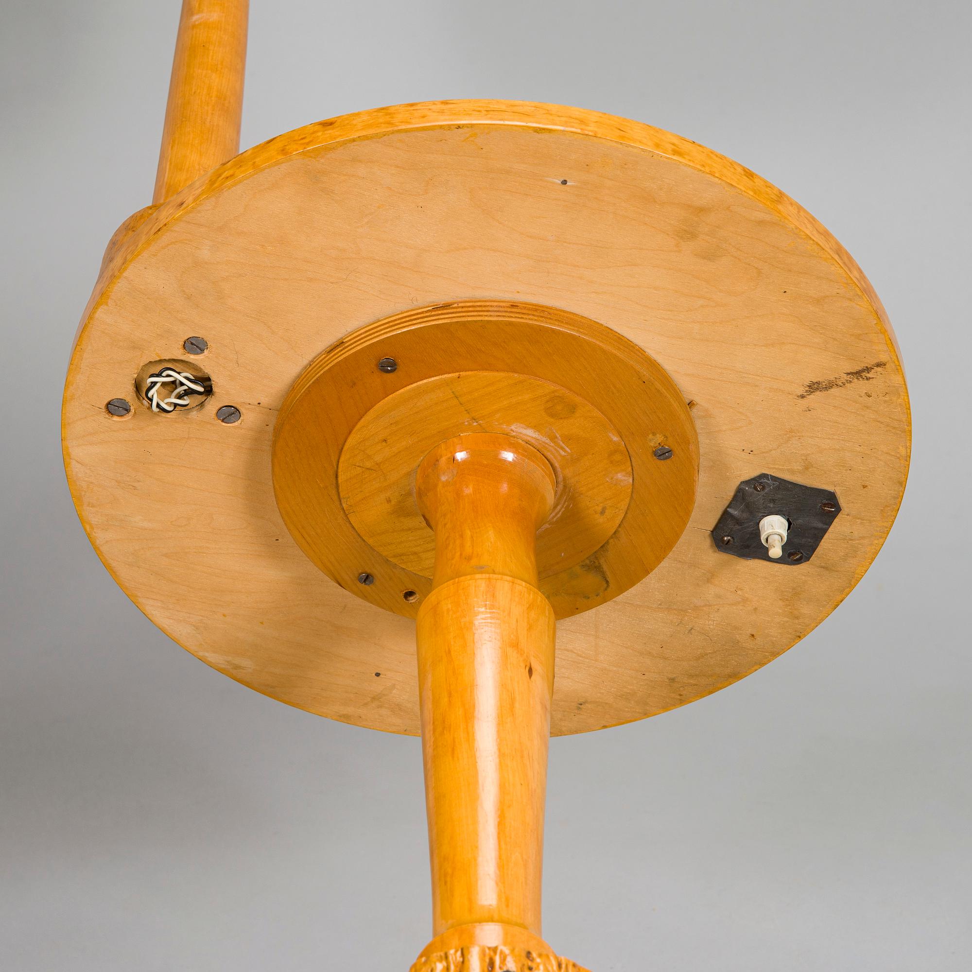 A 1930s burl birch lamp table.
