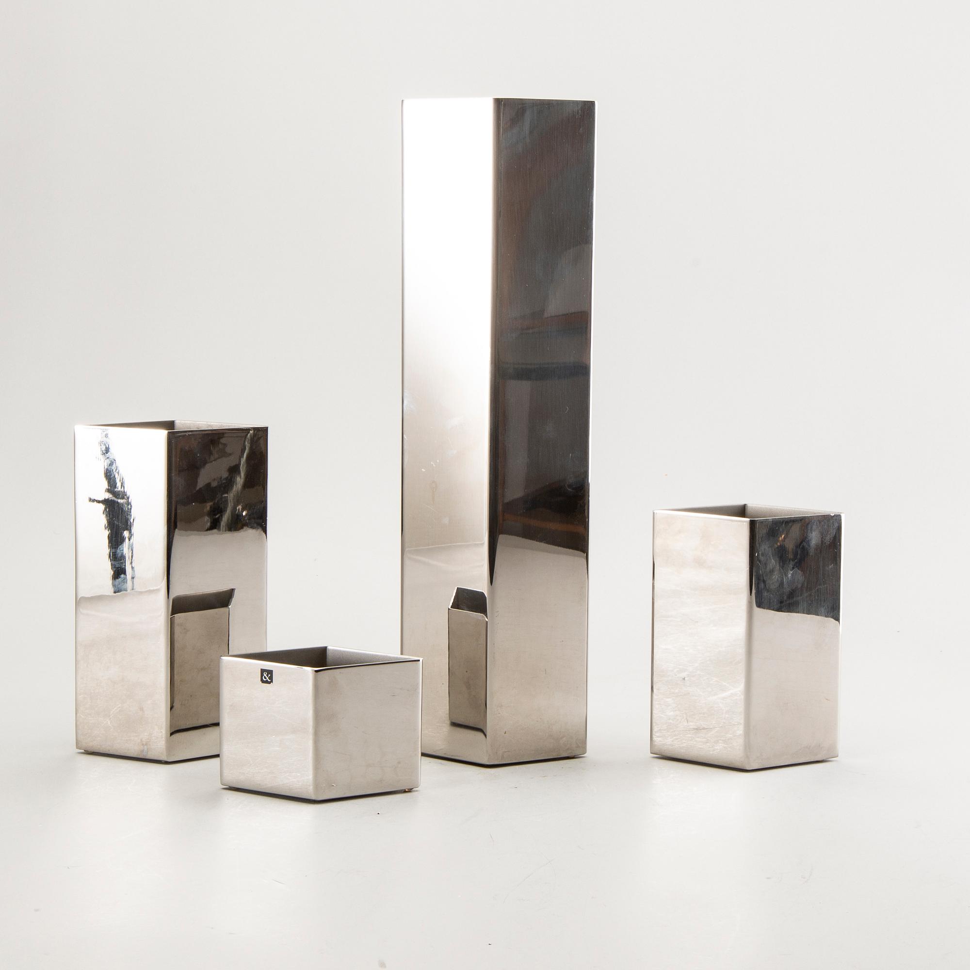 Sigurd Persson, a set of four metal signed vases.