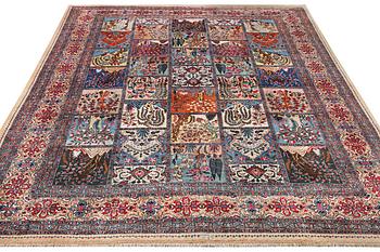 A Kashmar carpet, c. 387 x 297 cm.