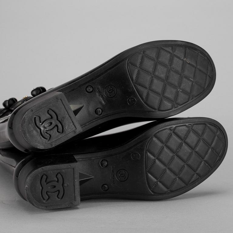 A pair of black Chanel Wellington boots, size 41.