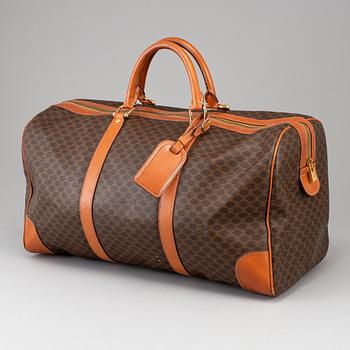 CÉLINE, a 'Macadam Duffle' bag.