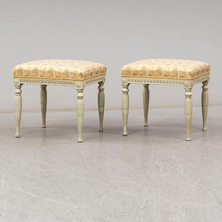 A pair of late gustavian stools, ca 1800.