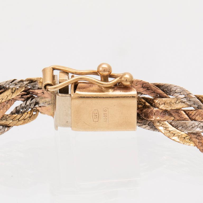 A 14K gold bracelet.