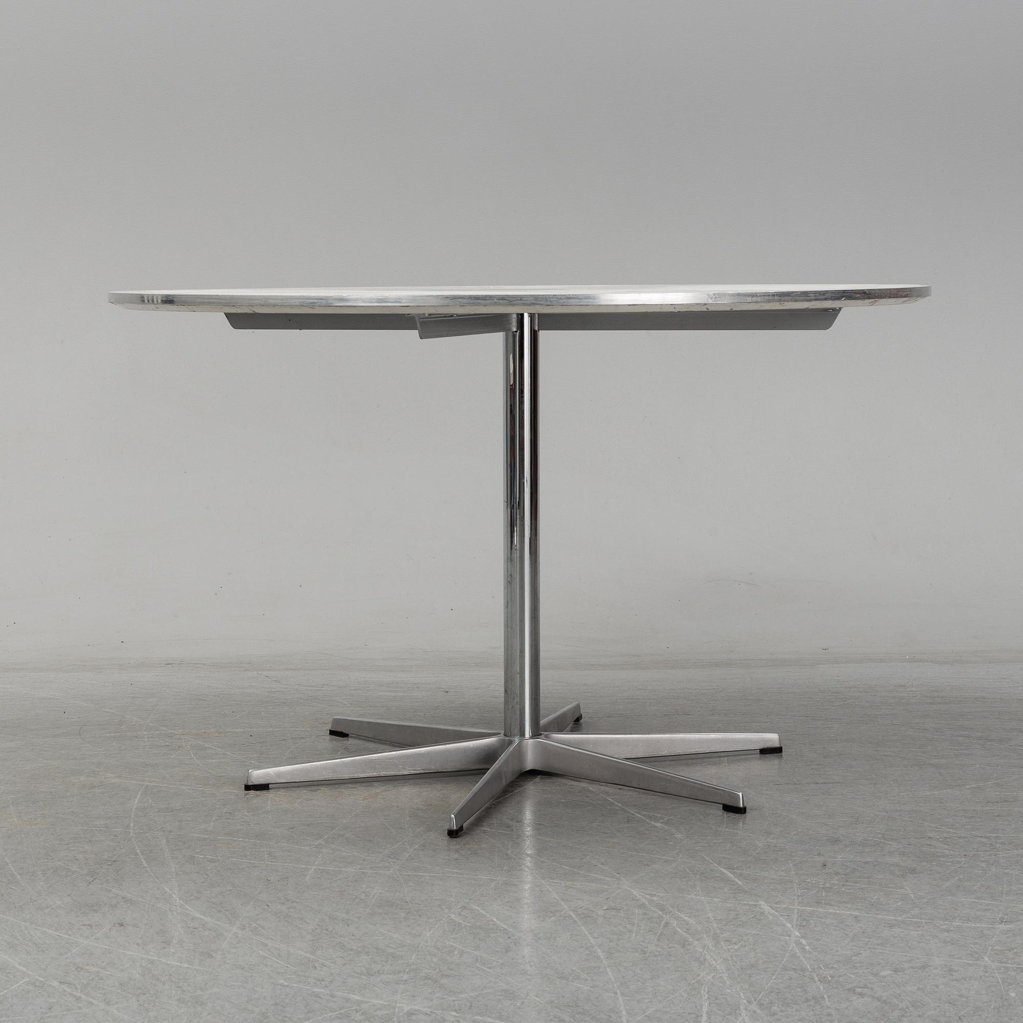 ARNE JACOBSEN, a table from Friz Hansen, Denmark, 2002.