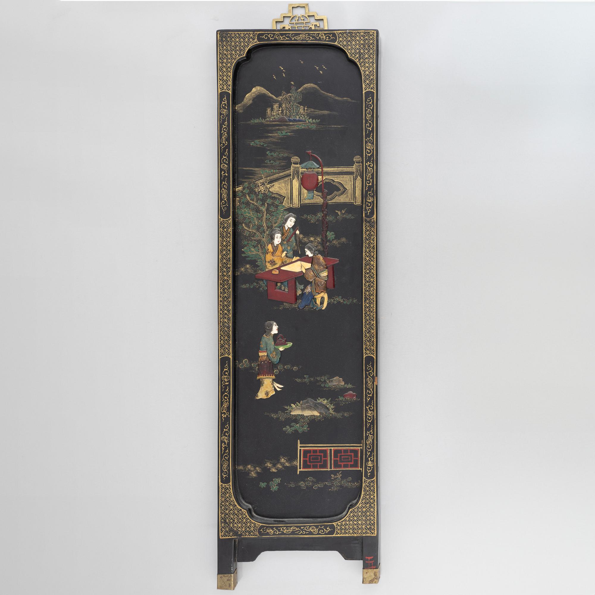 Four black-lacquered wall decorations, China, around 1900.
