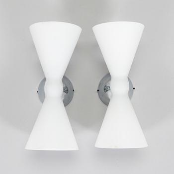 A pair of early 2000s wall lamps.