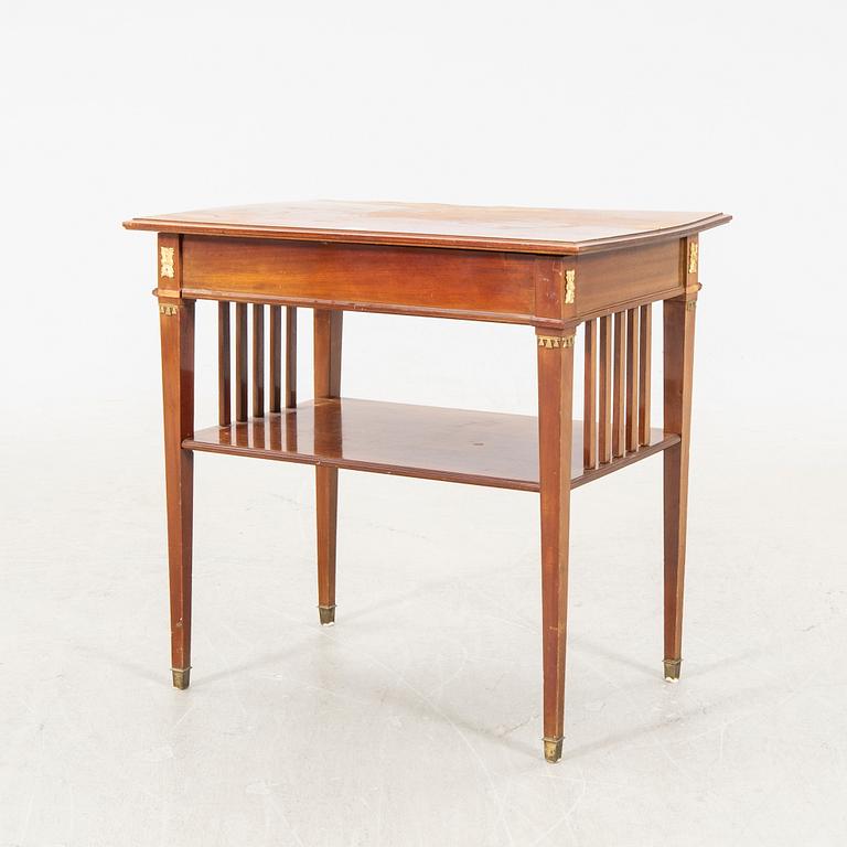 An Empire style mahogany table first half of the 20th century.