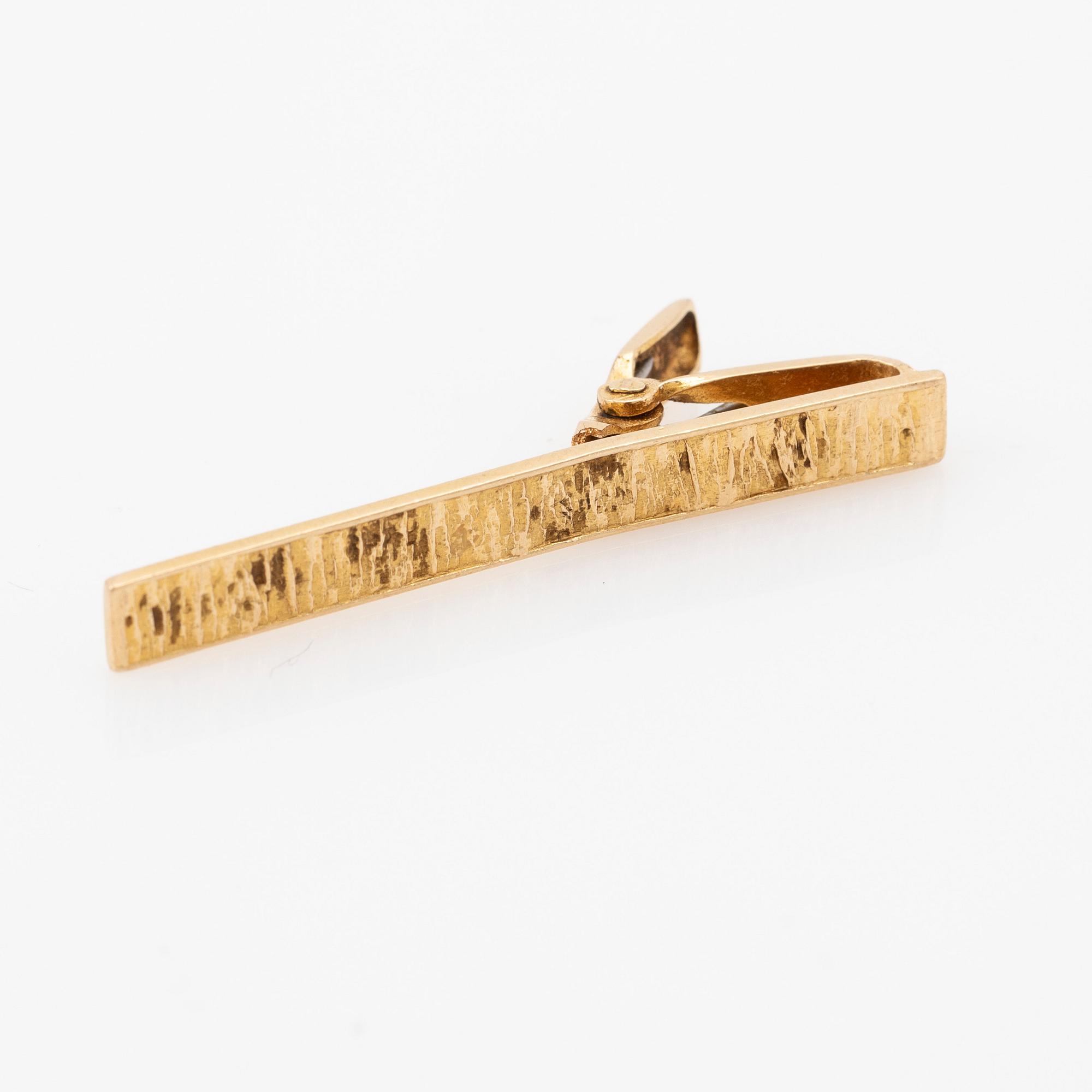 Lapponia, slipsknut, 18k guld.