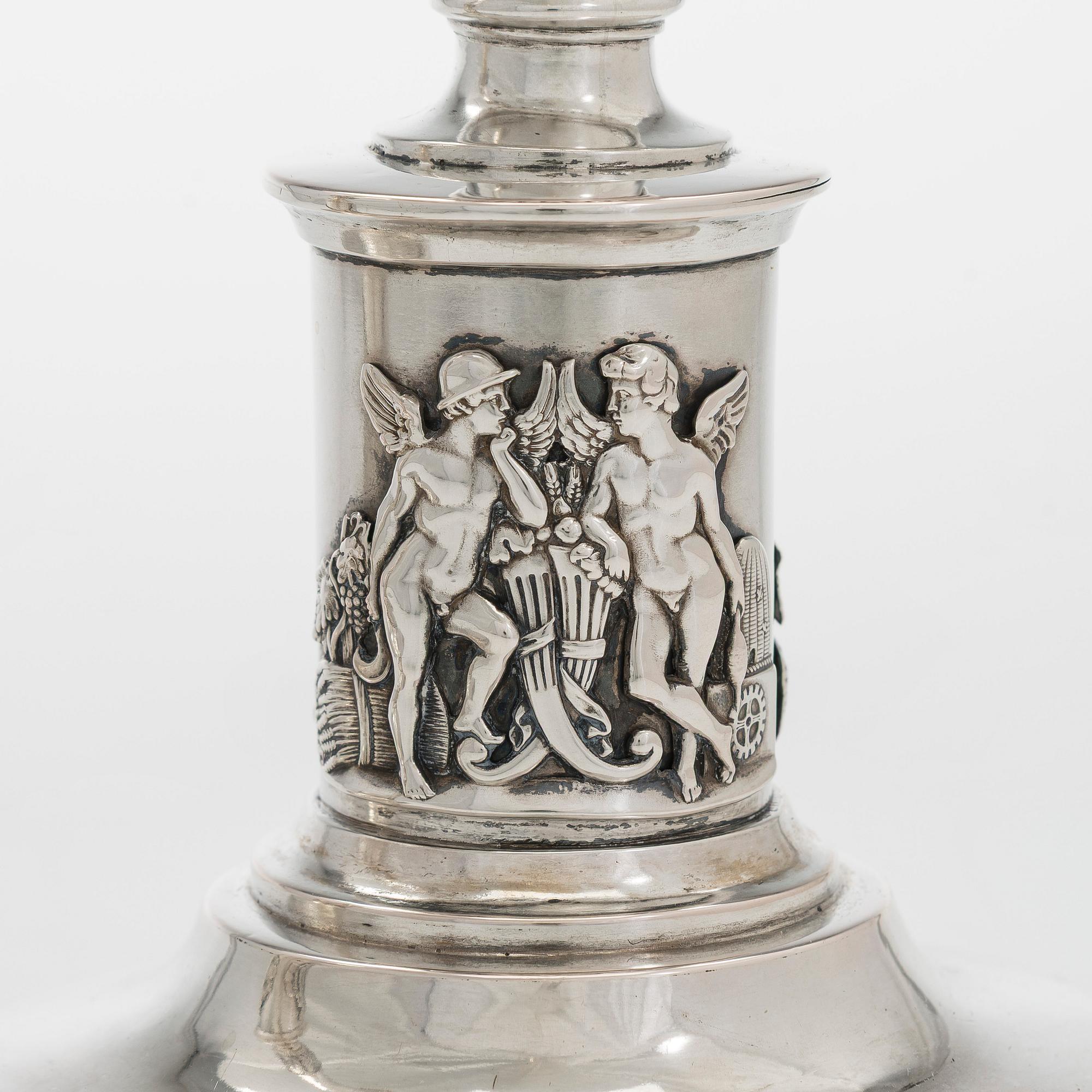 A pair of Empire silver candlesticks, Northern Europe, first half of the 19th century.