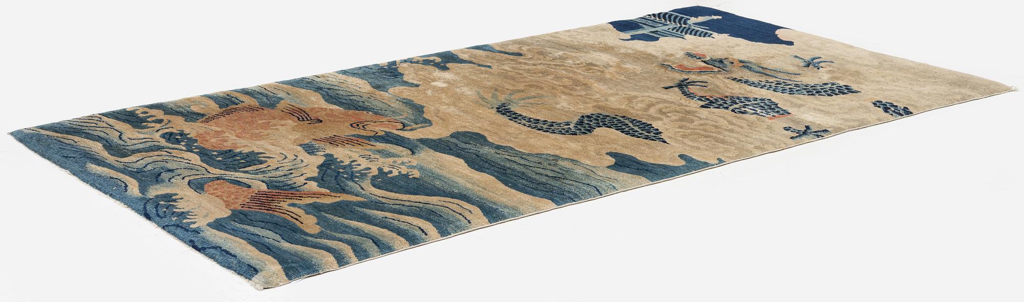 An antique Baotou rug, northern China, late Qing dynasty, circa 1900. c. 178x90 cm.