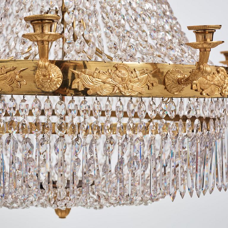 An Empire twelve-light chandelier, early 19th century.