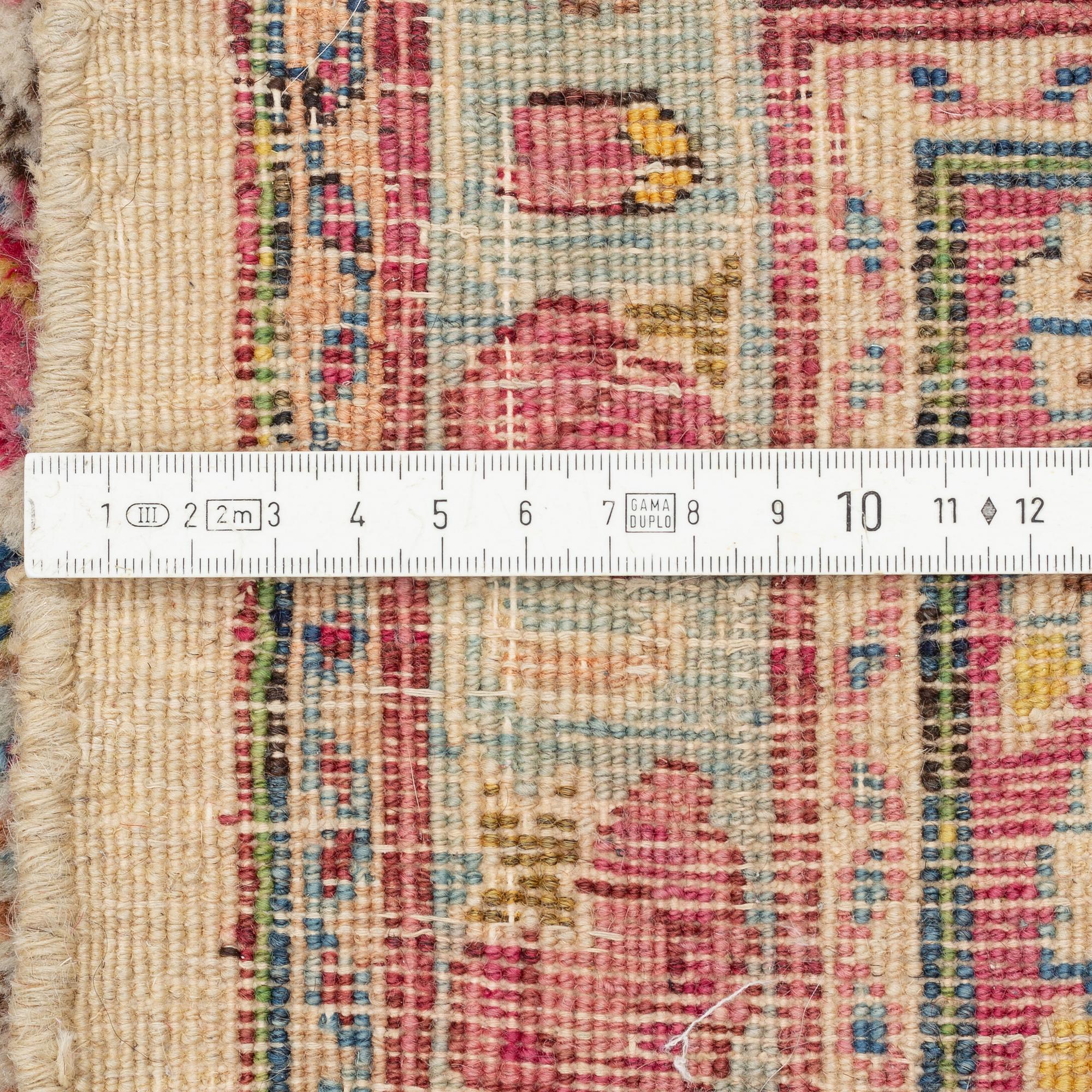 A Kirman carpet, old, c. 290 x 212 cm.